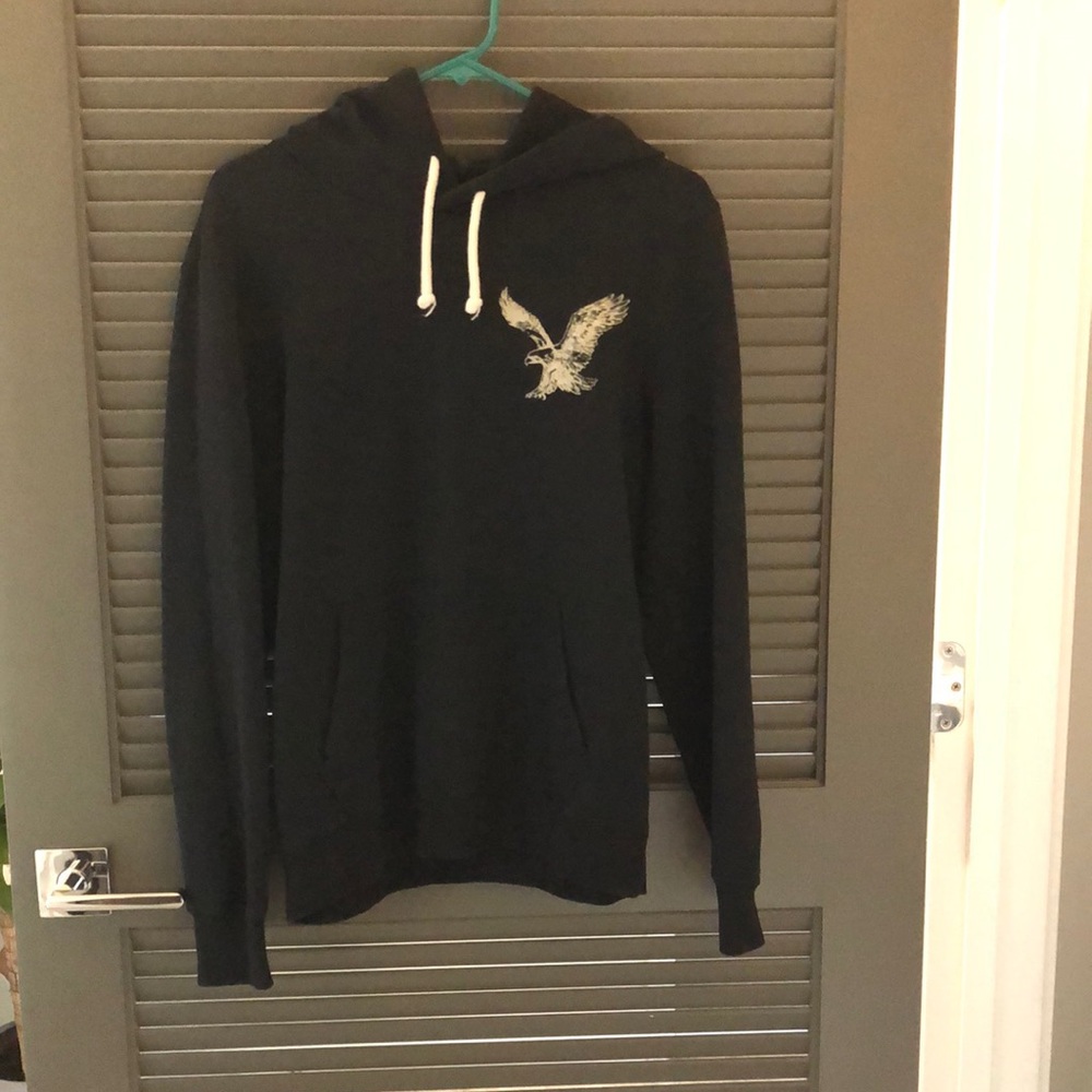 American eagle pull over hoodie sweater black size small in men’s lightly worn.